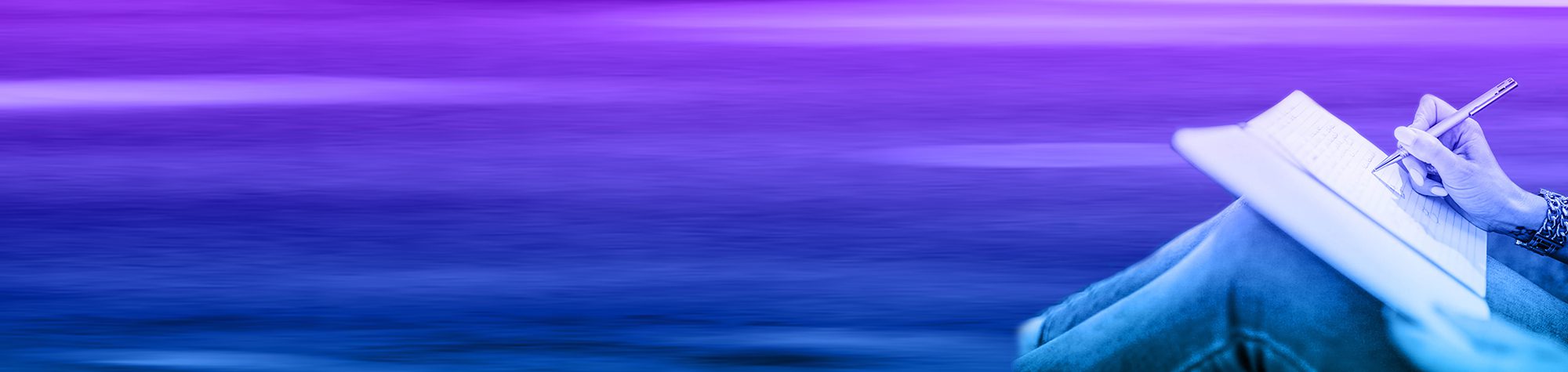 Woman writing in notebook