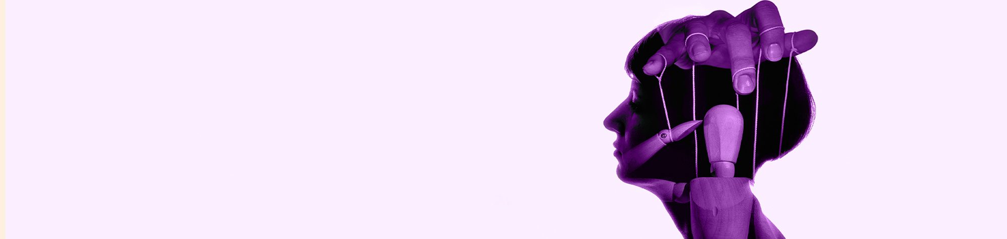 Silhouette of woman's head with a marionette inside